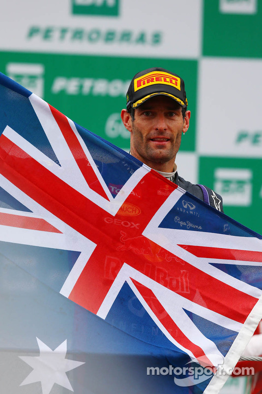 Mark Webber, Red Bull Racing celebrates his second position and last GP on the podium