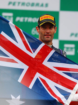 Mark Webber, Red Bull Racing celebrates his second position and last GP on the podium