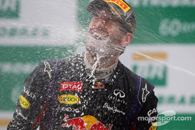 Mark Webber, Red Bull Racing celebrates his second position and last GP on the podium