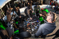 Extreme Speed Motorsports team members at work on the Honda engine