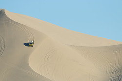 Jay Leno and Nani Roma share the Dakar winning Mini