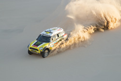 Jay Leno and Nani Roma share the Dakar winning Mini