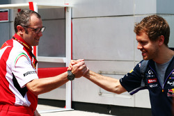 (L to R): Stefano Domenicali, Ferrari General Director with Sebastian Vettel, Red Bull Racing