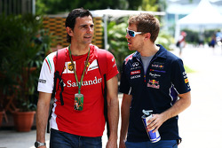 (L to R): Pedro De La Rosa, Ferrari Development Driver with Sebastian Vettel, Red Bull Racing