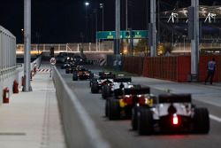 The cars leave the GP2 pitlane