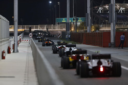 The cars leave the GP2 pitlane