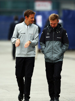 (L to R): Jenson Button, McLaren with team mate Kevin Magnussen, McLaren