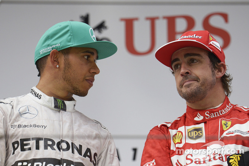 The podium Race winner Lewis Hamilton, Mercedes AMG F1 with Fernando Alonso, Ferrari