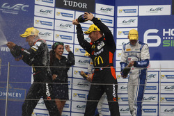 LM P2 podium: winners Roman Rusinov, Olivier Pla, Julien Canal, second place Matthew Howson, Richard Bradley, Tsugo Matsuda, third place Sergey Zlobin, Nicolas Minassian, Maurizio Mediani
