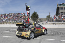 Winner Petter Solberg celebrates