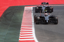 Kevin Magnussen, McLaren MP4-29 leads team mate Jenson Button, McLaren MP4-29