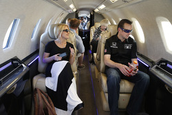 Kurt Busch and girlfriend Patricia Driscoll wait on a plane bound for Indianapolis