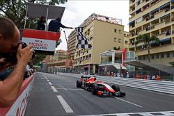 Jules Bianchi, Marussia F1 Team MR03 takes the chequered flag at the end of the race to score the team's first F1 points