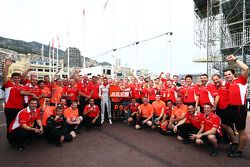 Jules Bianchi, and the Marussia F1 Team celebrate his and the team's first ever F1 points with his ninth place finish