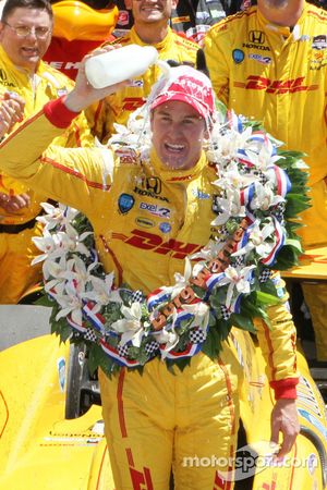 Ryan Hunter-Reay of Andretti Auto Sport celebrates with the traditional bottle of milk in Victory Circle after winning the 98th running of the Indianapolis 500 Mile Race