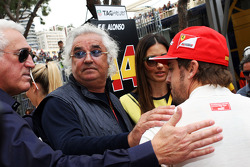 Flavio Briatore, with wife Elisabetta Gregoraci, and Fernando Alonso, Ferrari on the grid