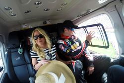 Kurt Busch waves from a helicopter prior to landing at Charlotte Motor Speedway