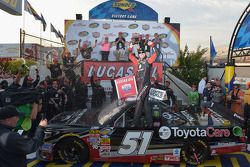 Race winner Kyle Busch celebrates