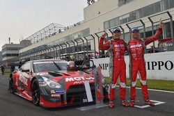 Race winners Tsugio Matsuda and Ronnie Quintarelli celebrate