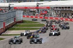 Nico Rosberg, Mercedes AMG F1 W05, locks up under braking at the start of the race next to team mate Lewis Hamilton, Mercedes AMG F1 W05