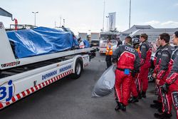 The crashed #1 Audi Sport Team Joest Audi R18 E-Tron Quattro back to the Audi compound after Loic Duval massive accident