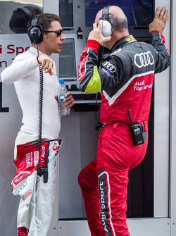 Loic Duval talks with Dr. Wolfgang Ullrich minutes before taking the wheel