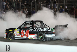 Race winner Darrell Wallace Jr. celebrates