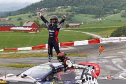 Winner Reinis Nitiss celebrates