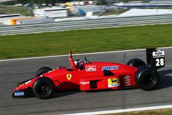 Gerhard Berger, is reunited with his Ferrari F1/87