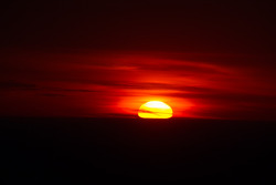The sun rises above Pikes Peak