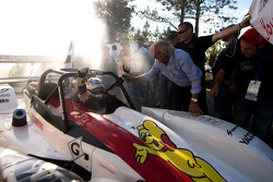 Romain Dumas celebrates overall victory with Norbert Santos and his team