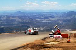 Romain Dumas waits at the summit