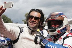 Dario Franchitti takes a selfie with Wayne Gardner