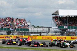 Sebastian Vettel, Red Bull Racing RB10 and Nico Hulkenberg, Sahara Force India F1 VJM07 at the start of the race