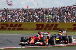 Fernando Alonso, Ferrari F14-T leads Sebastian Vettel, Red Bull Racing RB10