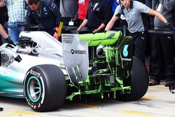 Nico Rosberg, Mercedes AMG F1 W05 running flow-vis paint on the rear wing and rear diffuser