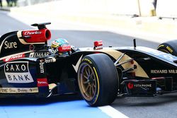 Charles Pic, Lotus F1 E22 Third Driver leaves the pits running new 18 inch Pirelli tyres and rims