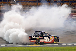 Race winner Erik Jones celebrates