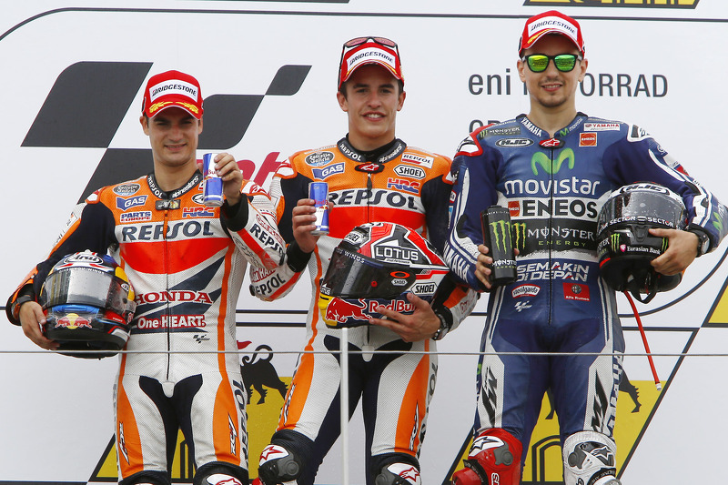 Podium: race winner Marc Marquez, second place Dani Pedrosa, third place Jorge Lorenzo