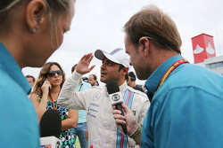 Bernie Ecclestone, on the grid with Rubens Barrichello