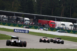 Kimi Raikkonen, Ferrari F14-T leads Fernando Alonso, Ferrari F14-T and Sebastian Vettel, Red Bull Ra