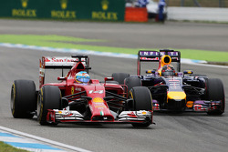 Fernando Alonso, Ferrari F14-T and Sebastian Vettel, Red Bull Racing RB10 battle for position