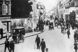 Racing amongst horses and pedestrians on a busy street in Mantes-la-Ville en route to Rouen