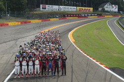 Drivers group photo at Eau Rouge