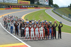 Drivers group photo at Eau Rouge