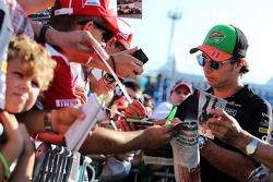 Sergio Perez, Sahara Force India F1 signs autographs for the fans