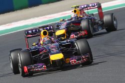 Sebastian Vettel, Red Bull Racing RB10 leads team mate Daniel Ricciardo, Red Bull Racing RB10