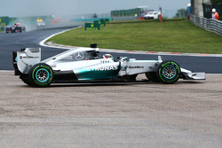 Lewis Hamilton, Mercedes AMG F1 W05 recovers from a spin at turn two at the start of the race