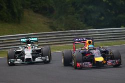 Sebastian Vettel, Red Bull Racing RB10 and Lewis Hamilton, Mercedes AMG F1 W05