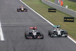 Jean-Eric Vergne, Scuderia Toro Rosso and Lewis Hamilton, Mercedes AMG F1 Team